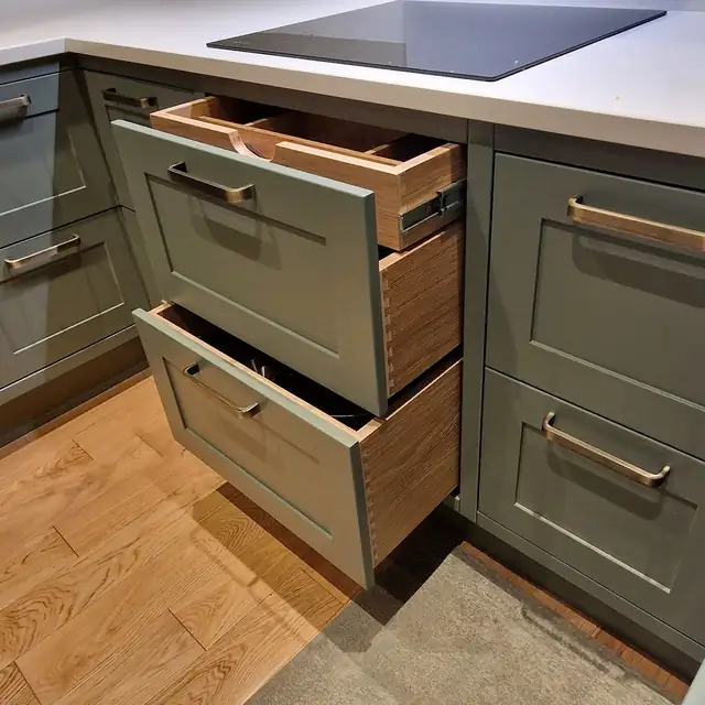 Sage green shaker kitchen drawers with dovetailed solid wood boxes